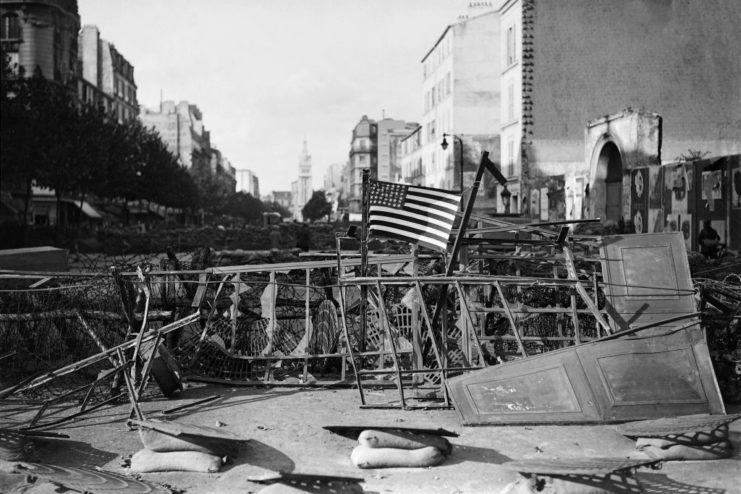 American flag atop a barricade