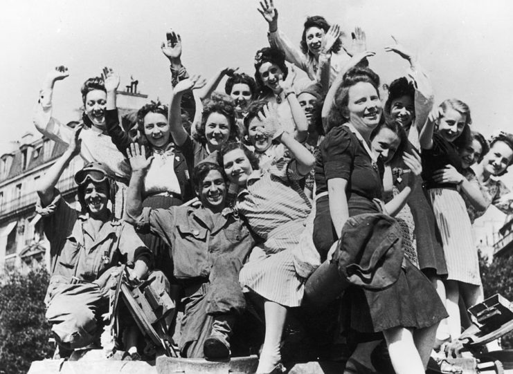 Group of Parisians smiling at the camera