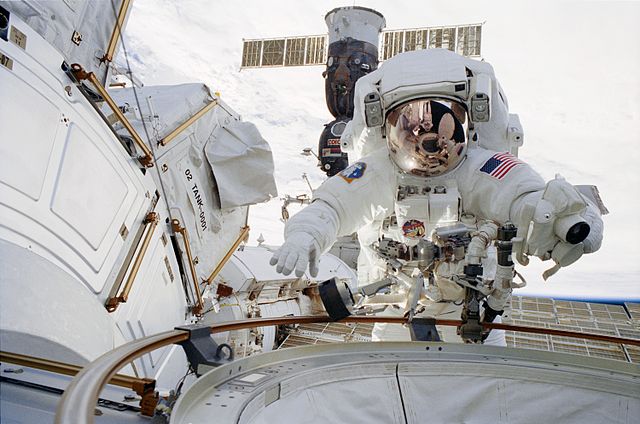 John Herrington performing a spacewalk