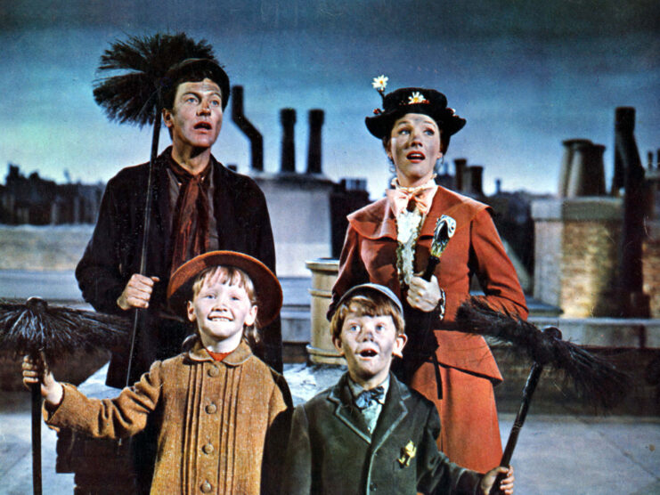 Dick Van Dyke, Julie Andrews, Karen Dotrice and Matthew Garber as Mr. Dawes Sr., Mary Poppins, Jane Banks and Michael Banks in 'Mary Poppins'