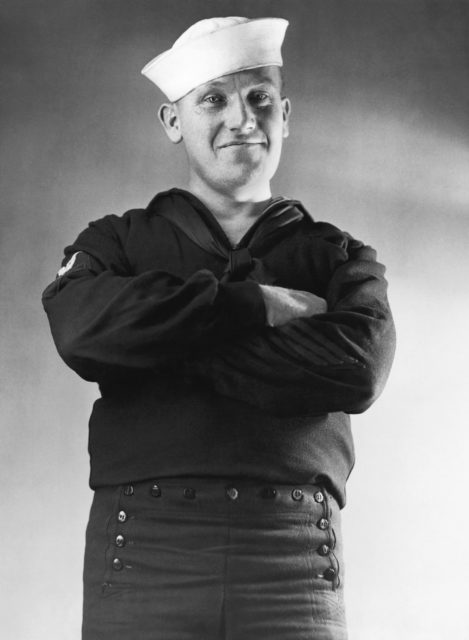 Portrait of a US Navy sailor wearing 13-button pants