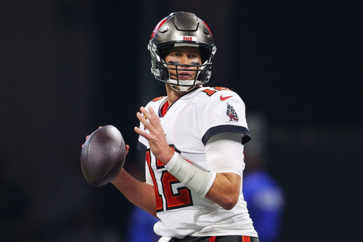 Tom Brady holding a football