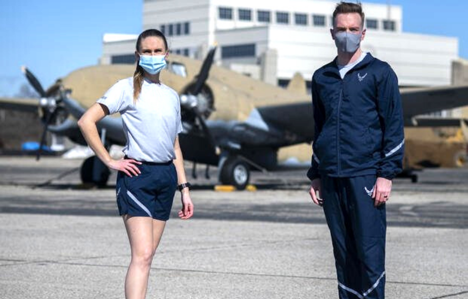 Two US Air Force airmen standing in uniform