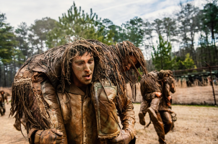 US Army Sniper School trainees in the ghillie wash