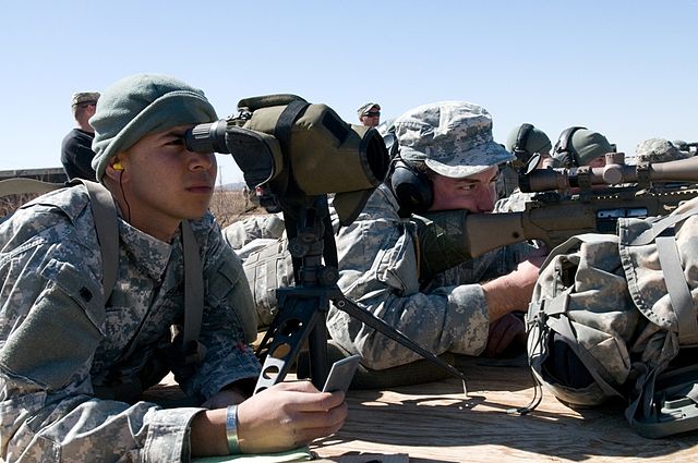 US Army Sniper School trainees aiming sniper rifles