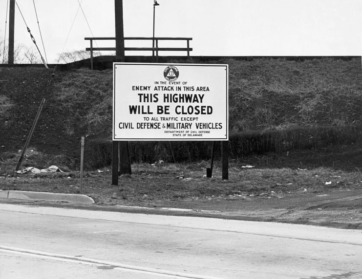 Road sign informing drivers the highway will be closed in the event of a nuclear attack