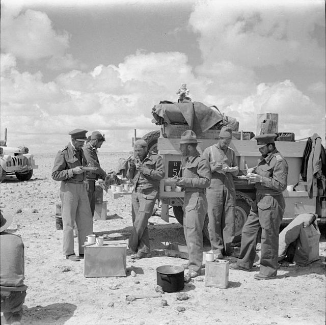 Members of the Long Range Desert Group standing around a truck