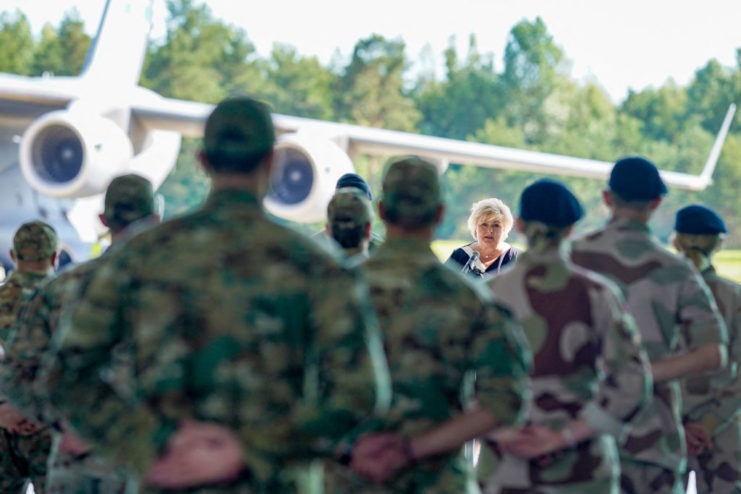 Norwegian soldiers standing with their hands behind their backs