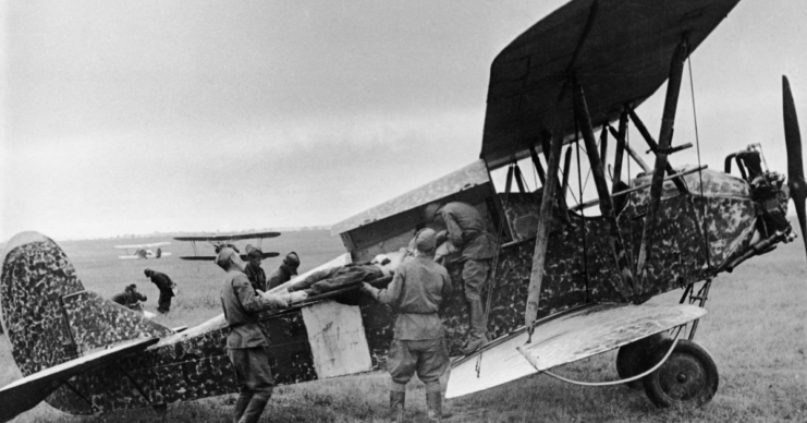 wounded soldier being loaded into a po-2