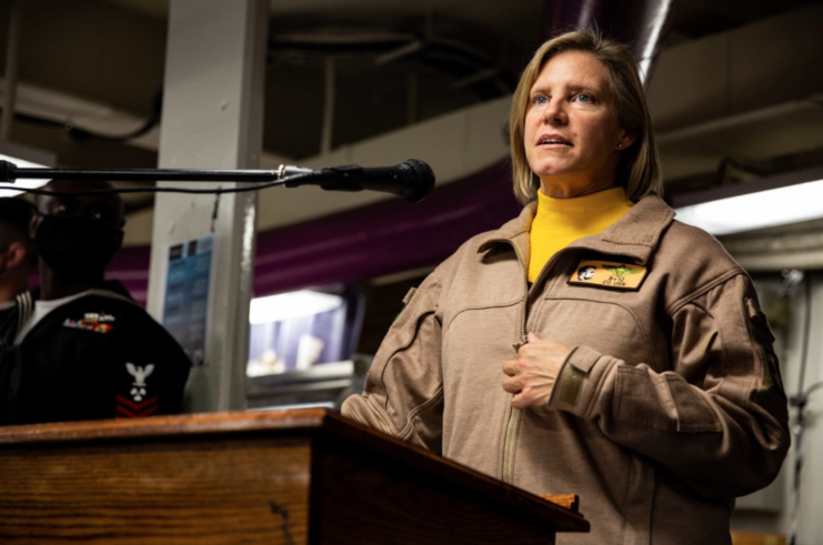 Capt. Amy Bauernschmidt speaking at a podium