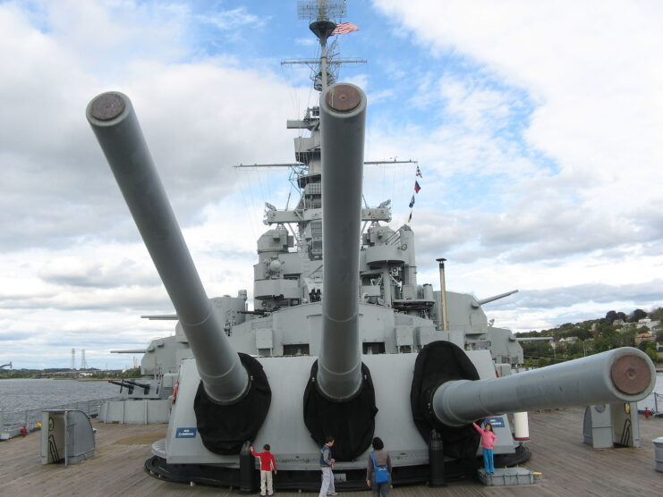 People walking around the rear turret of the USS Massachusetts (BB-59)