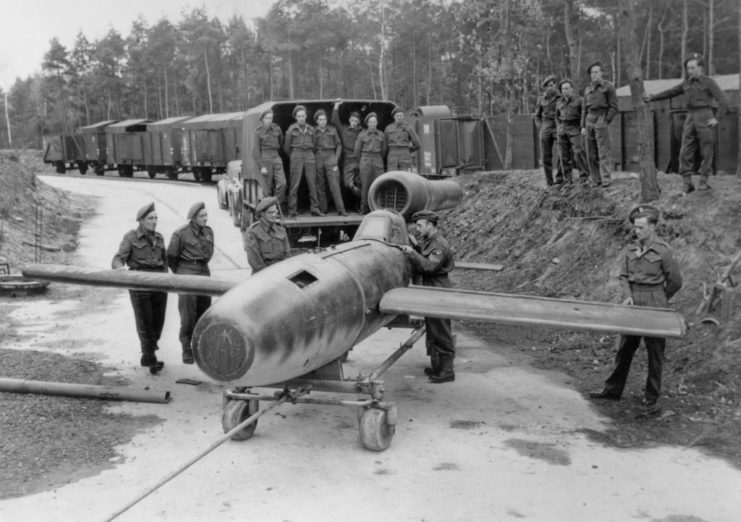 British soldiers surrounding a captured Luftwaffe pulsejet-engined Fieseler Fi-103R Reichenberg piloted flying bomb
