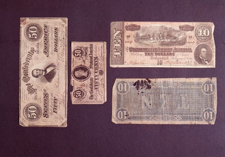 Confederate banknotes laid out on a table