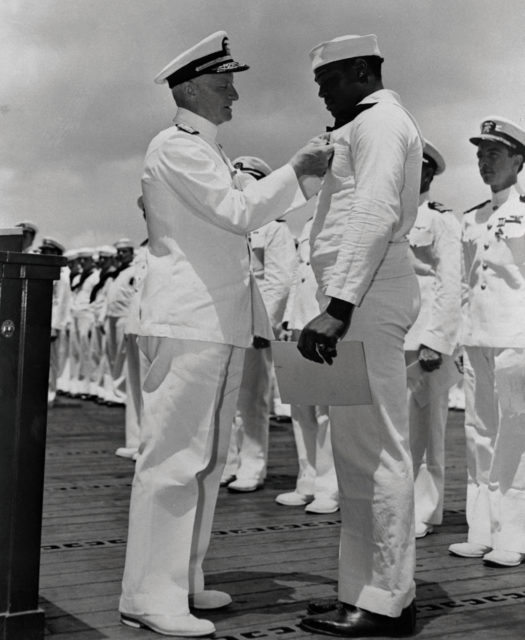 Admiral Chester Nimitz Awards Dorie Miller with the Navy Cross