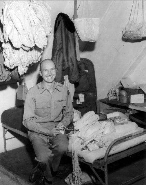 Gail Halvorsen sitting on a cot