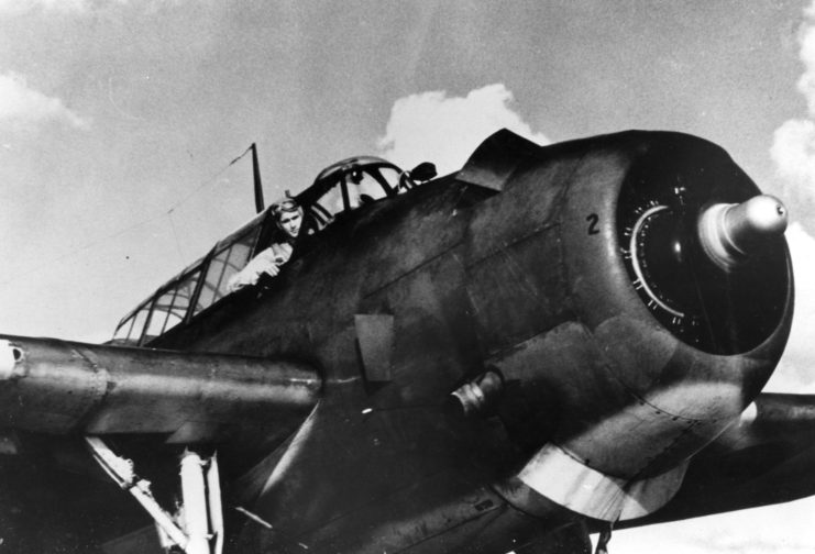 George H.W. Bush sitting in the cockpit of a Grumman VT-51 Avenger