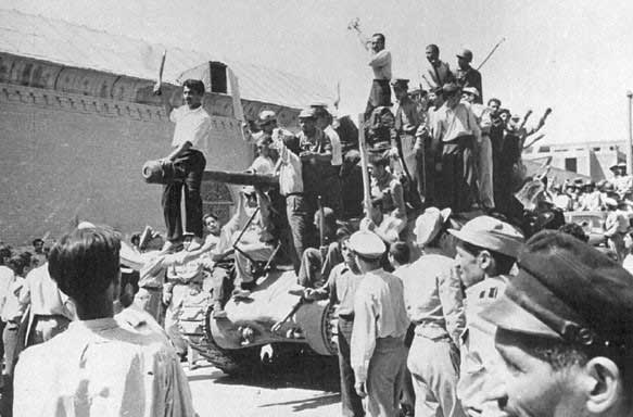 Iranians celebrate in the street during the 1953 coup.