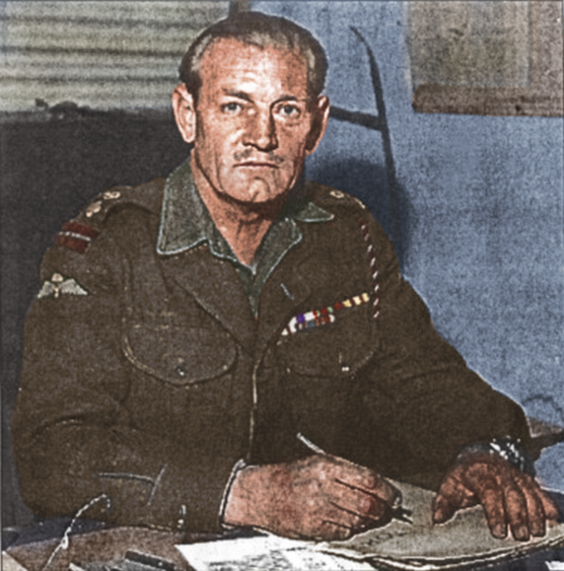 Jack Churchill sitting at a desk