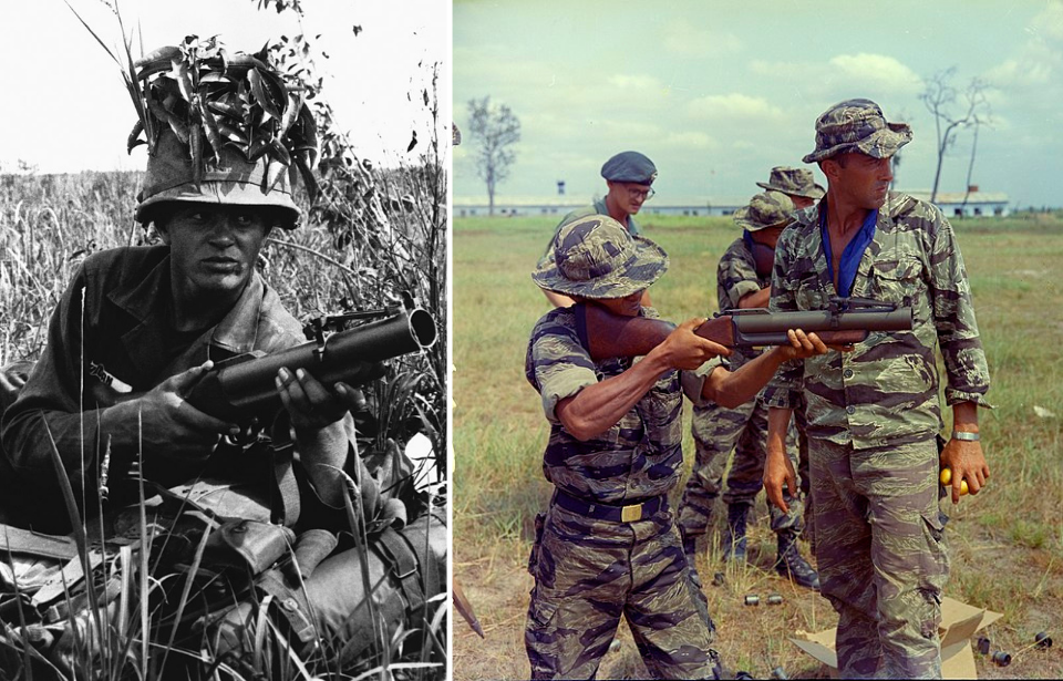 Pvt. Marvin Jordan crouching in the grass while holding an M79 grenade launcher + SSG Alvin J. Rouly supervising trainees firing M79 grenade launchers