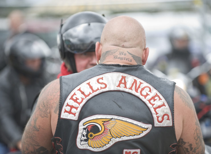 An biker from an English chapter of the Hells Angels wears the Group's jacket 