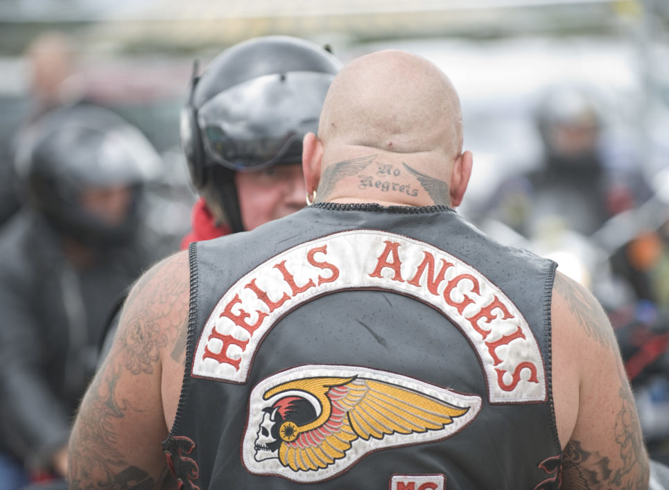 An biker from an English chapter of the Hells Angels wears the Group's jacket