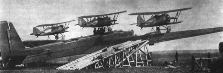 Tupolev TB-3 and three Polikarpov I-5