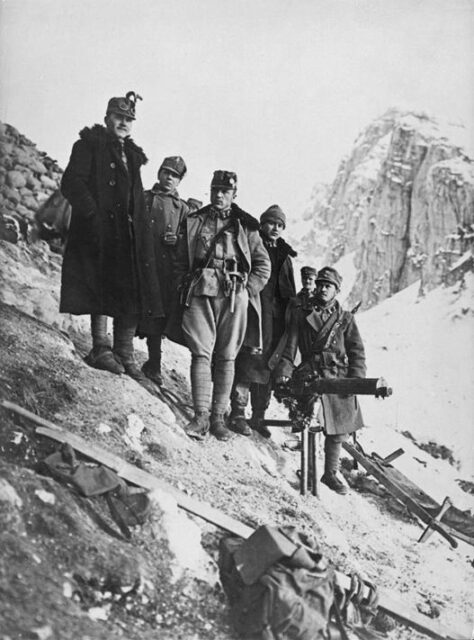 Six Austro-Hungarian soldiers standing with a Maxim gun