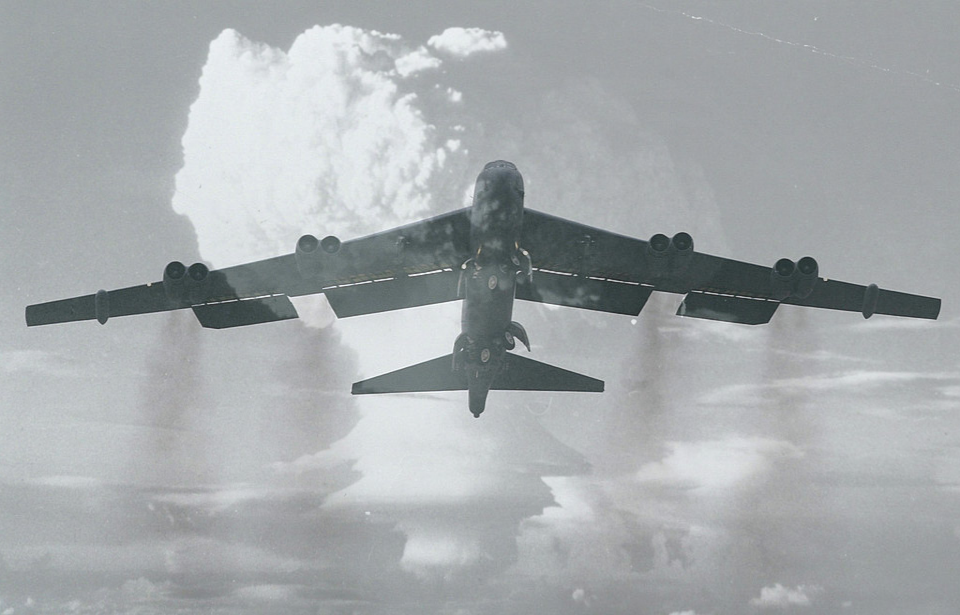 B-52 Stratofortress in flight + Mushroom cloud