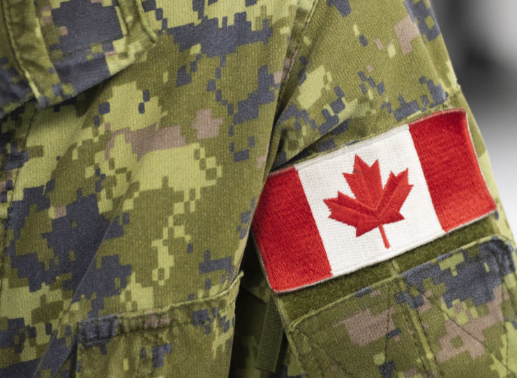 Canadian flag on the uniform of a Canadian Armed Forces member