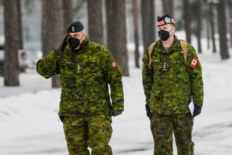 Canadian Armed Forces members walking in Latvia 