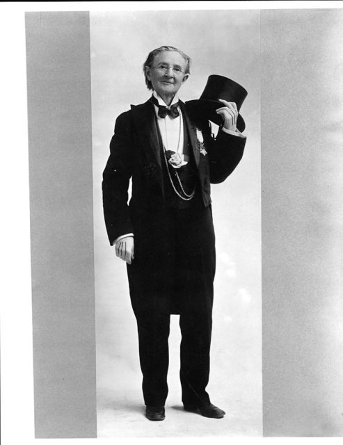 Mary Edwards Walker dons a full suit with a top hat