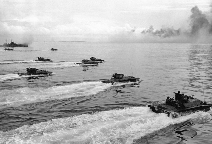 Tracked landing vehicles driving through the ocean
