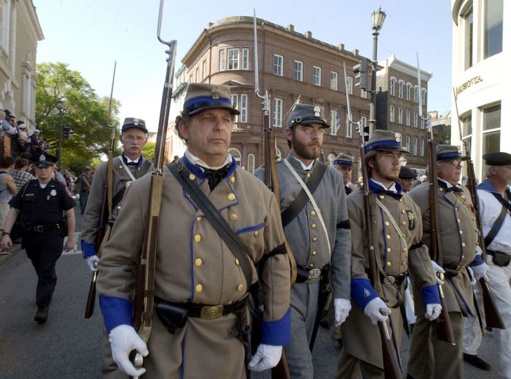 Confederate re-enactors hold a mock funeral for the crew of the H.L. Hunley