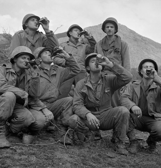 American soldiers drinking Coca-Cola