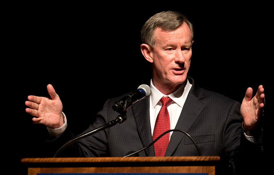 Admiral McRaven speaking at a podium