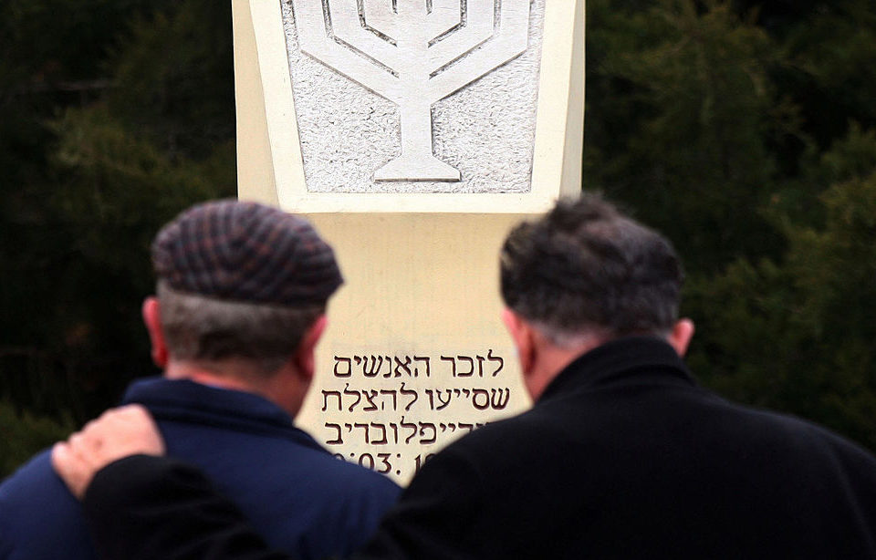 Two men at a memorial ceremony for Bulgarian Jews