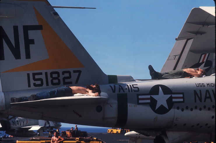 Soldiers relax on A-6 Intruders