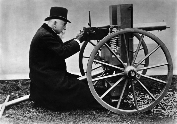 Hiram Maxim aiming a Maxim Gun