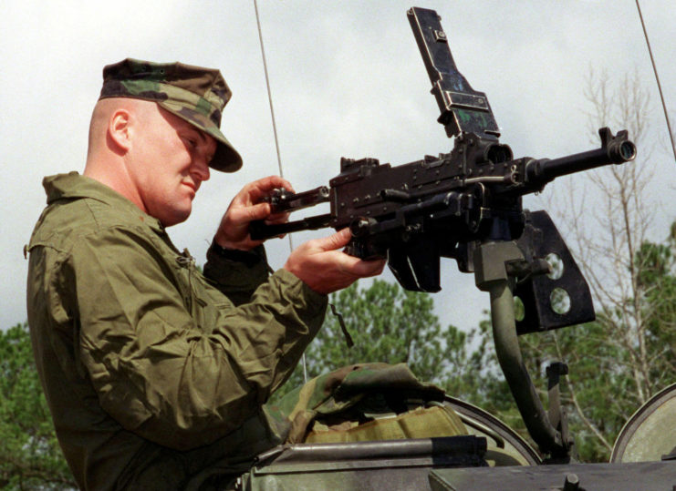 A United States Marine operates an M240 gun