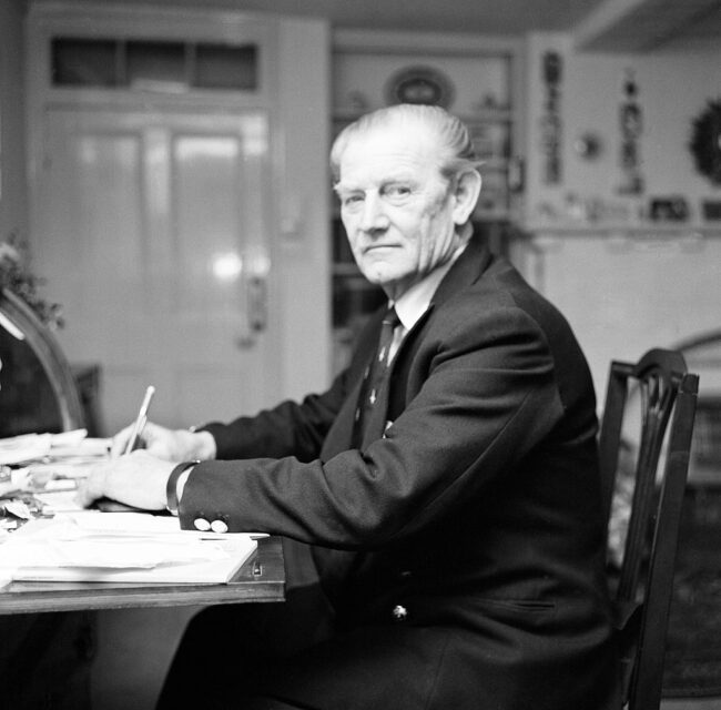 John "Mad Jack" Churchill writing at a desk