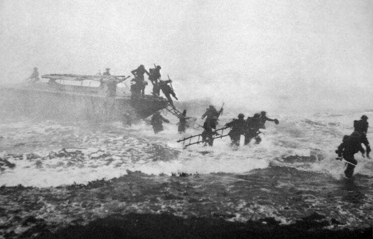 John "Mad Jack" Churchill and others running from an LCP (L), through the water, to the shore