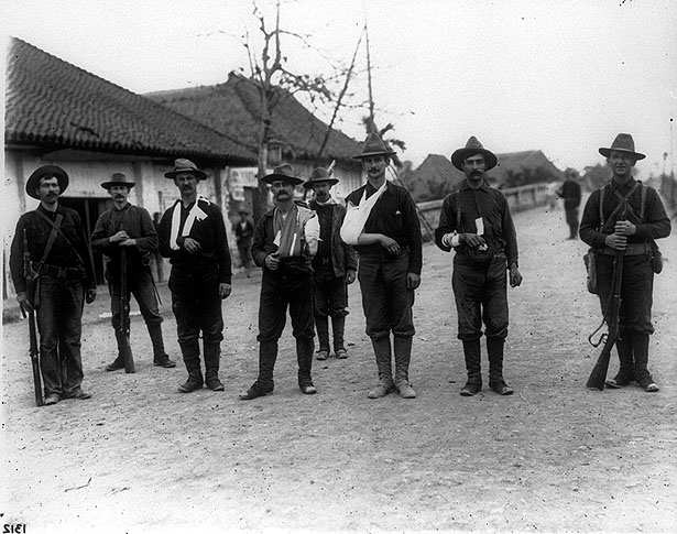Wounded American soldiers standing in a row