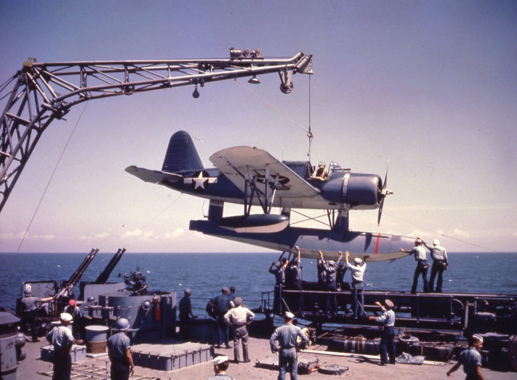OS2U-2 Kingfisher plane being loaded onto the USS Missouri