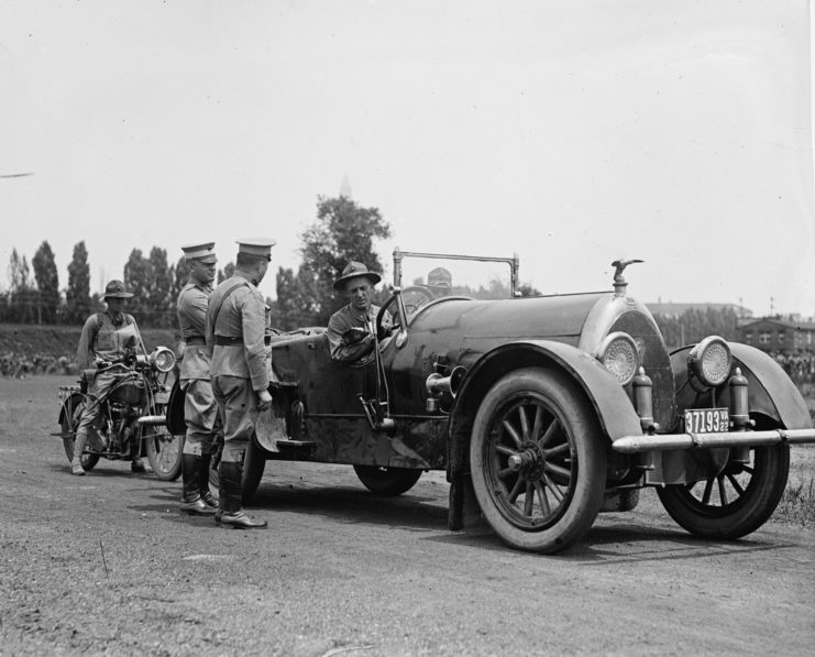 Smedley Butler sitting in a car