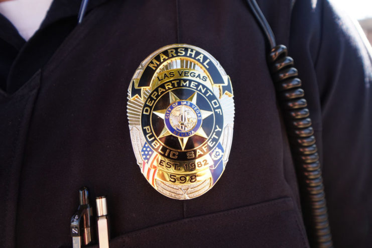 US Marshals badge on a uniform