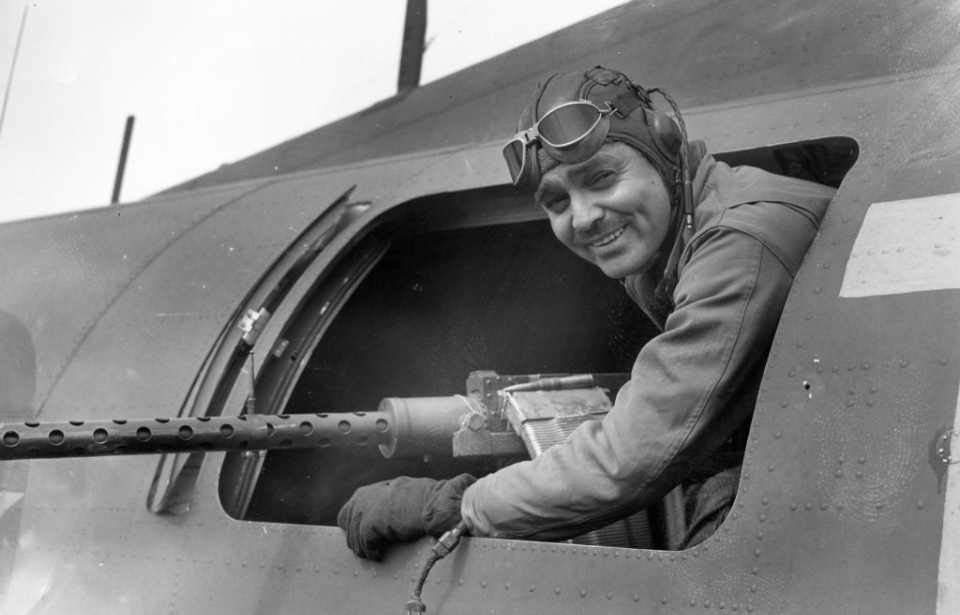 Clark Gable sticking his head out of an aircraft