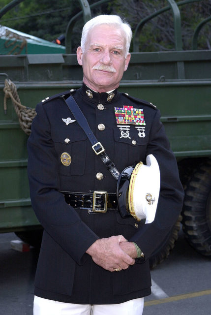 Dale Dye standing in his US Marine Corps uniform