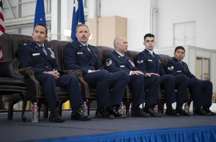 Lt. Col. Dominic Calderon, 1st Lt. Kyle Anderson, Master Sgt. Silva Foster, Senior Airman Michael Gellar and Staff Sgt. Dennis Gonzales-Furman sitting in chairs