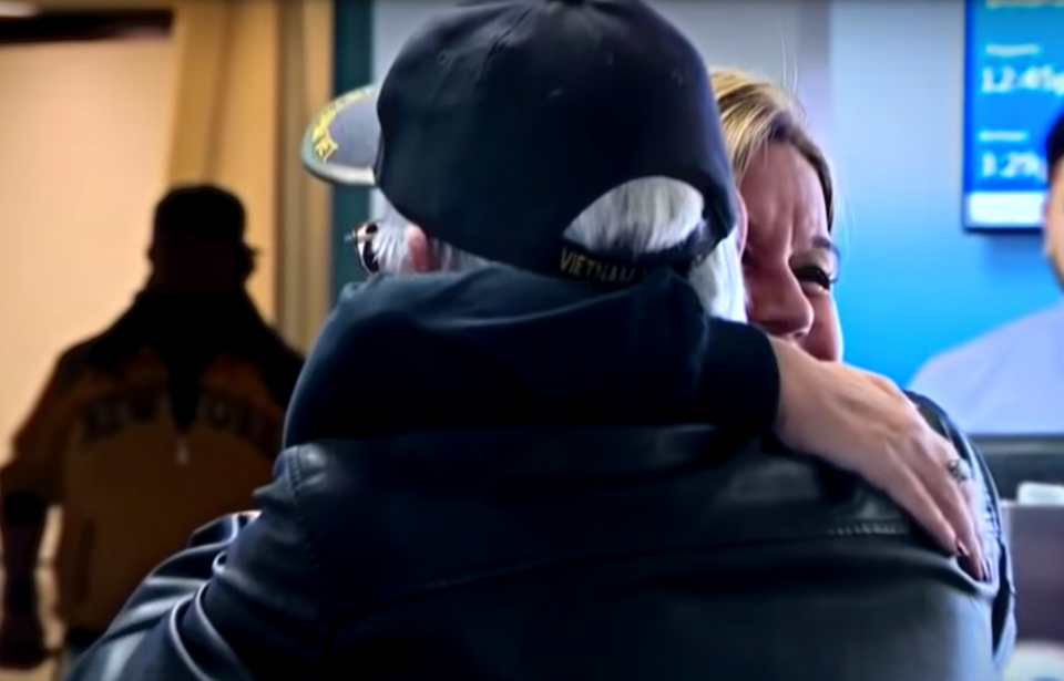 Gary Barnes hugging Olivia Robles