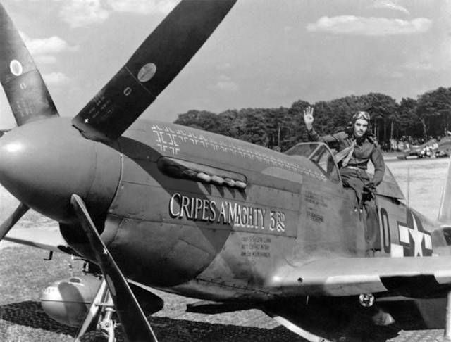 George Preddy Jr. sitting in the cockpit of his North American P-51 Mustang